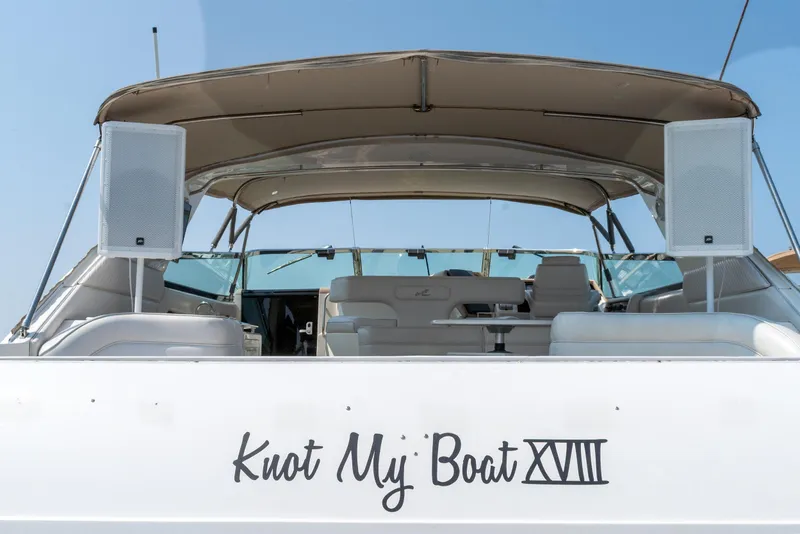 Slide: The Image of 1996 Sea Ray 630 Super Sun Sport yacht with "Knot My Boat XVIII" name on the stern. - 6