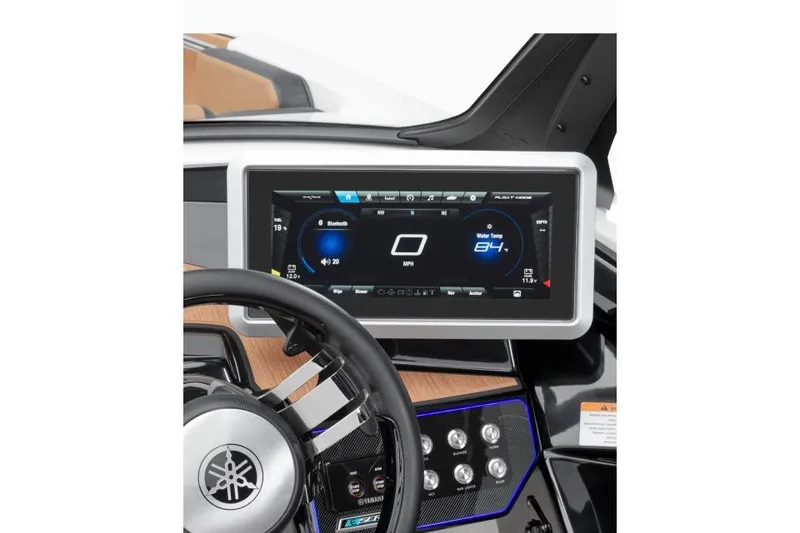 Slide: The Image of 2026 Yamaha Boats 222SD cockpit with modern steering, touchscreen, and wood-style flooring. - 6