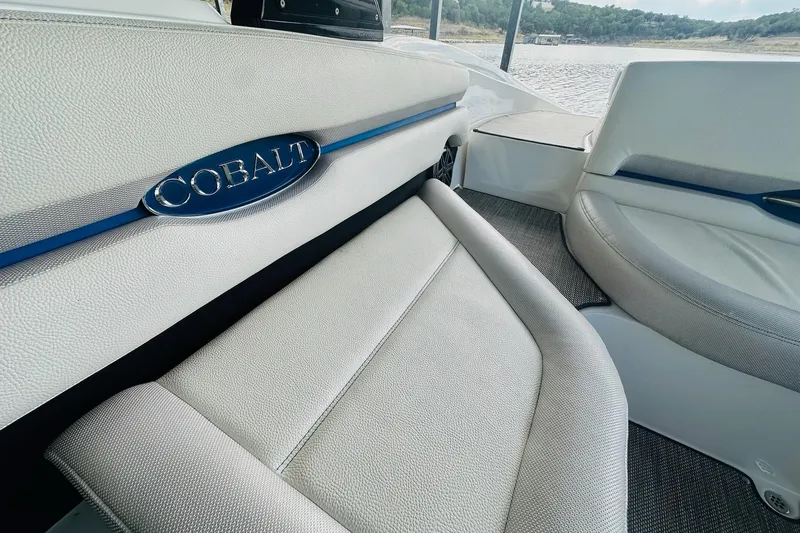 Slide: The Image of 2018 Cobalt CS23 Surf boat interior with comfortable seating and elegant design. - 18