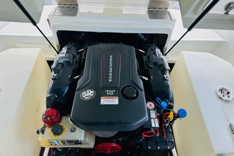 Slide: The Image of 2018 Cobalt CS23 Surf boat engine, featuring a Volvo Penta 350 V8. - 25