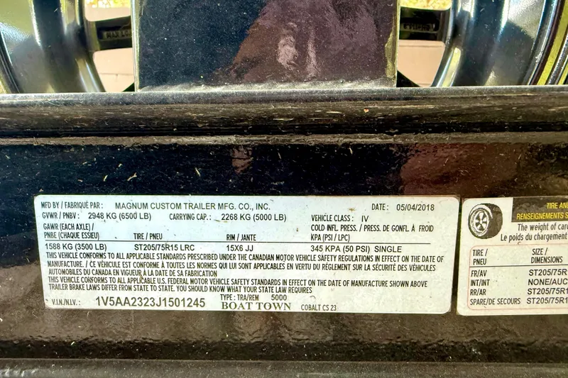 Slide: The Image of 2018 Cobalt CS23 Surf trailer label with specifications and safety standards. - 37