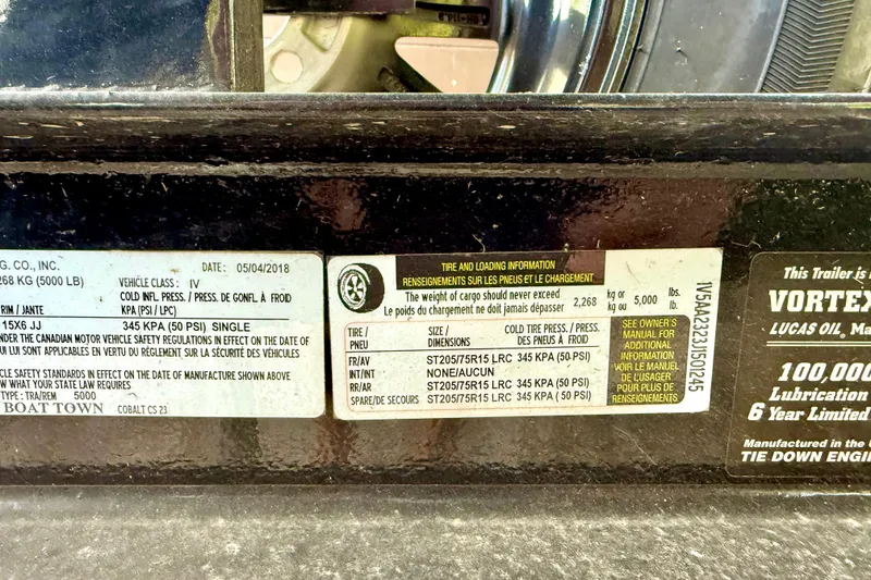Slide: The Image of 2018 Cobalt CS23 Surf trailer label showing tire and loading information. - 38