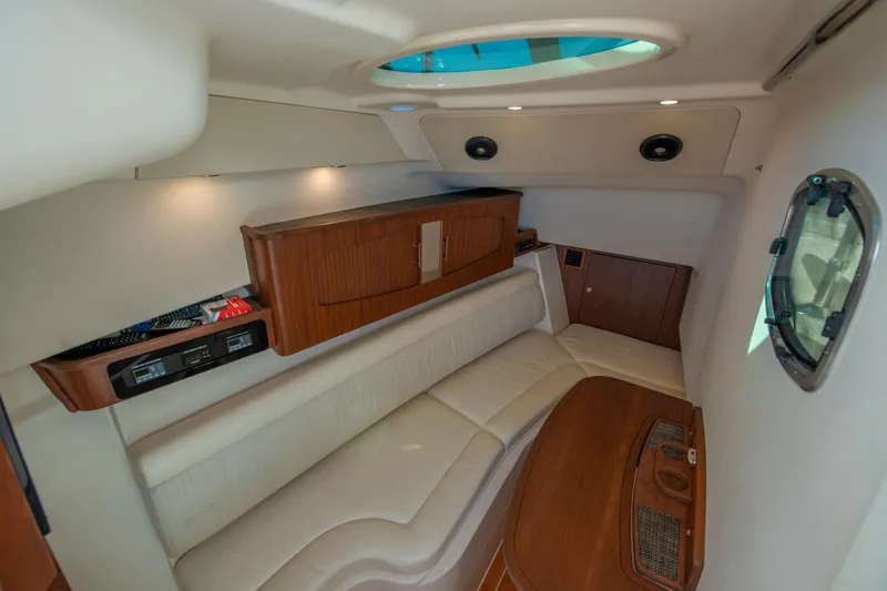 Slide: The Image of Luxurious interior of 2019 Grady-White Freedom 375 boat with plush seating and wooden accents. - 35