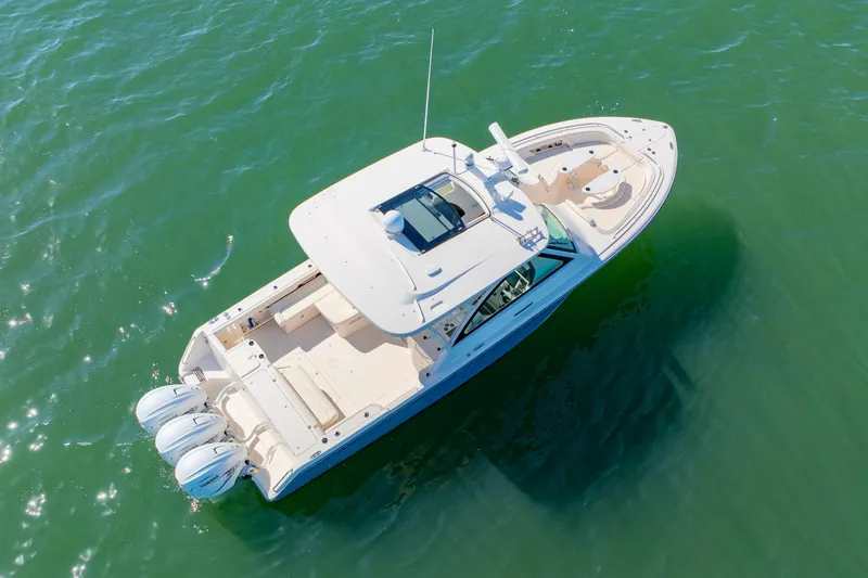 Slide: The Image of 2019 Grady-White Freedom 375 boat on open water, aerial view. - 5