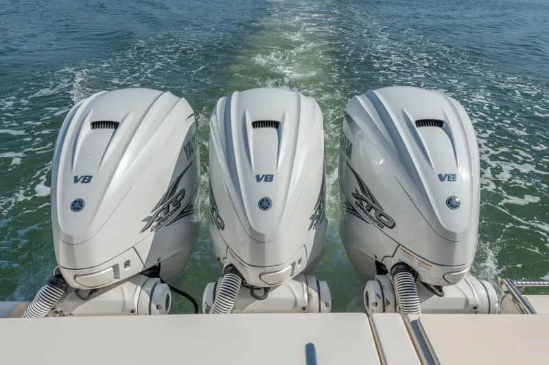 Slide: The Image of Triple Yamaha V8 outboard engines on a 2019 Grady-White Freedom 375 boat. - 9