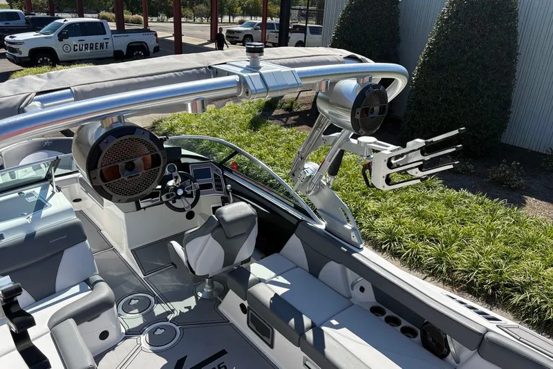 Slide: The Image of Interior of a 2019 MasterCraft boat with sleek seating and advanced audio system. - 14
