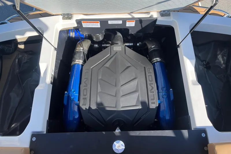 Slide: The Image of 2025 MasterCraft NXT23 boat engine compartment with Ilmor engine. - 14
