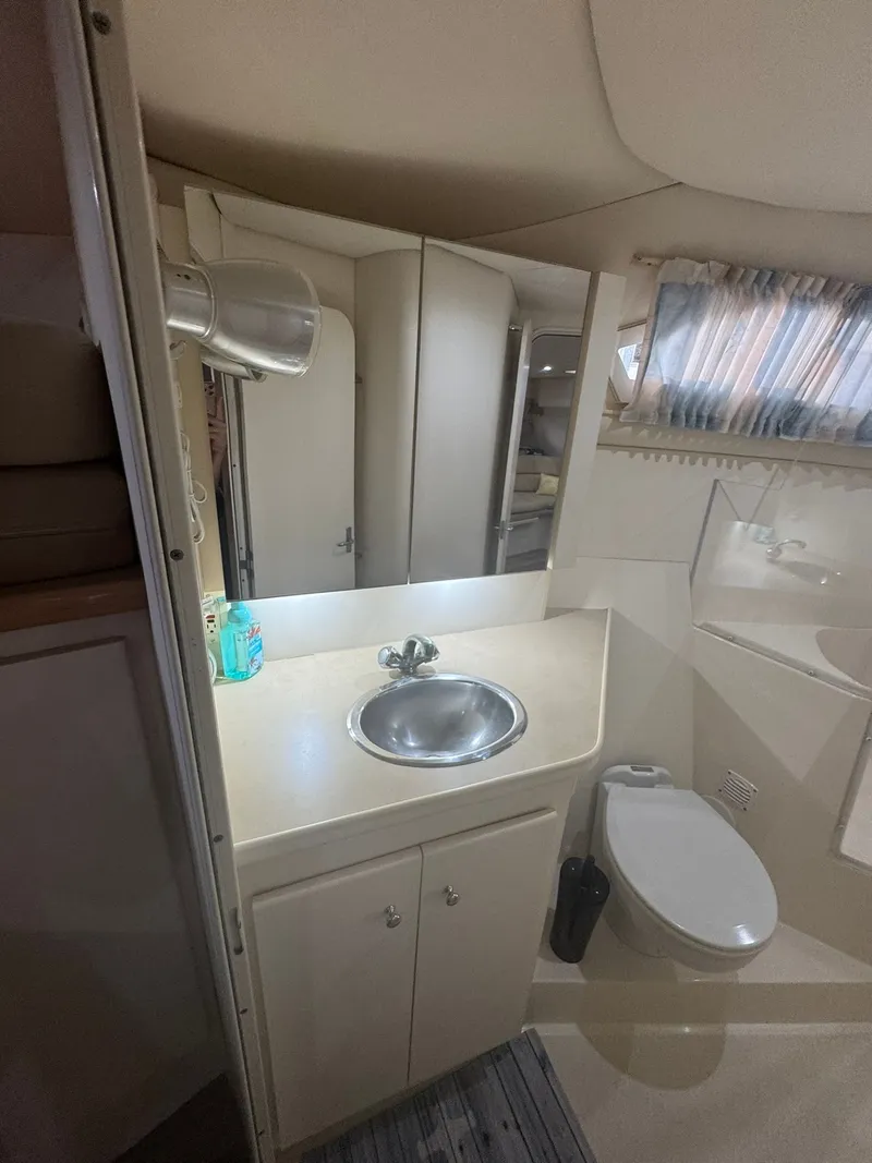 Slide: The Image of Bathroom interior of 1997 Carver 380 Santego yacht with sink and toilet. - 21