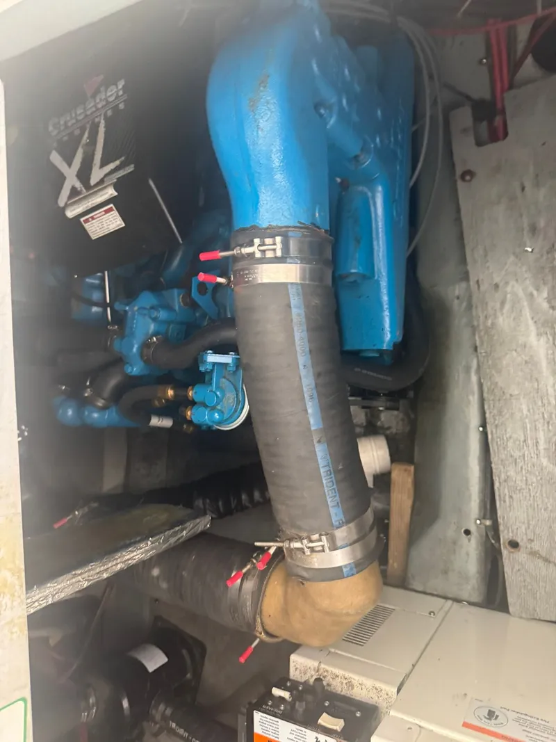 Slide: The Image of Engine compartment of a 1997 Carver 380 Santego with Crusader XL engine. - 25