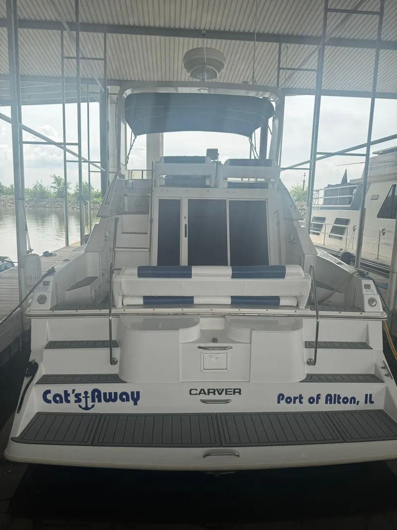 Slide: The Image of 1997 Carver 380 Santego yacht docked at Port of Alton, IL, named "Cat's Away". - 5
