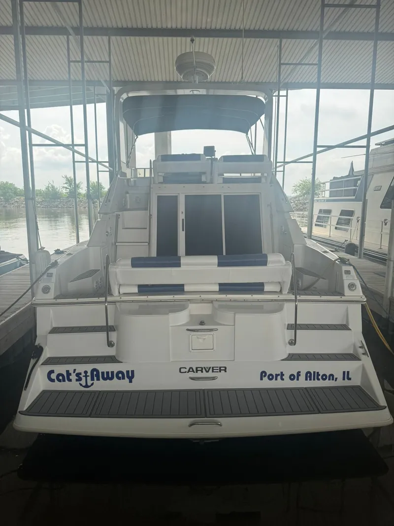 Slide: The Image of 1997 Carver 380 Santego yacht docked at Port of Alton, IL, named "Cat's Away". - 7