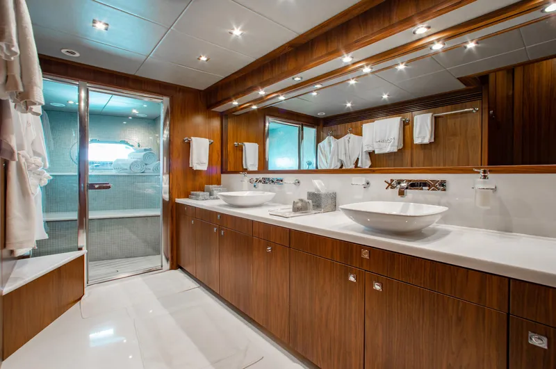 Slide: The Image of Luxurious bedroom interior on 2014 Sunseeker 131 yacht, featuring elegant design and plush bedding. - 18