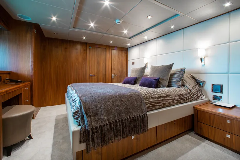 Slide: The Image of Luxurious wooden interior of 2014 Sunseeker 131 yacht with shelving and storage. - 20
