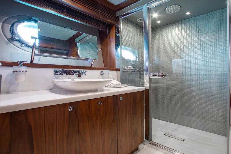 Slide: The Image of Luxurious interior of 2014 Sunseeker 131 yacht with elegant wooden staircase and cozy bedrooms. - 24