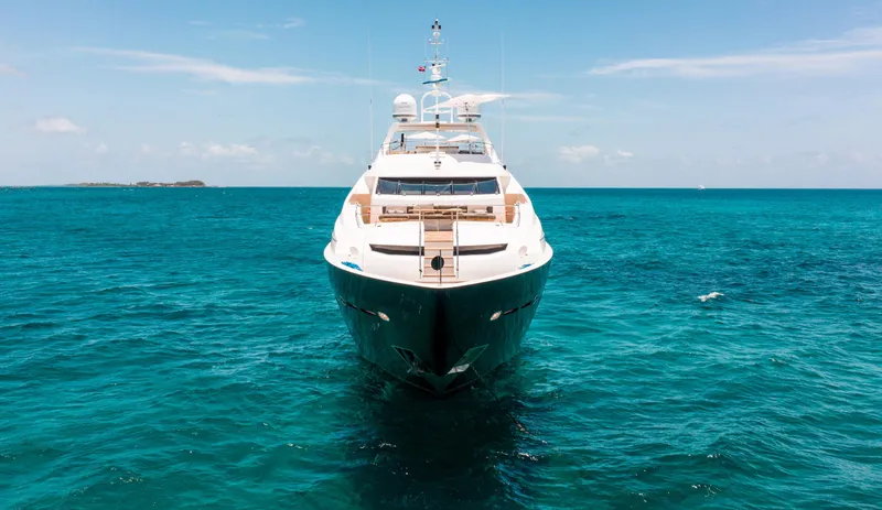 Slide: The Image of Luxurious 2014 Sunseeker 131 yacht cruising on open sea under clear skies. - 3