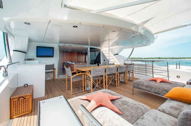 Slide: The Image of Luxurious Sunseeker 131 yacht deck with elegant seating, ocean view, and modern decor, 2014 model. - 34
