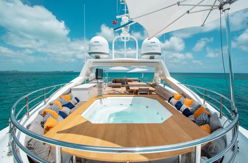 Slide: The Image of Luxurious Sunseeker 131 yacht helm, 2014 model, featuring modern navigation equipment and elegant wood finishes. - 41