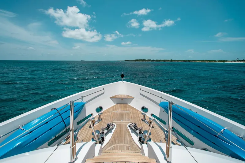 Slide: The Image of Bow view of 2014 Sunseeker 131 yacht cruising on open sea under clear skies. - 44