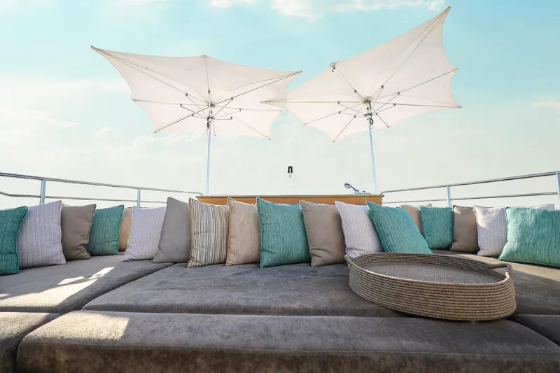 Slide: The Image of Luxurious Sunseeker 131 yacht deck with cushions and umbrellas, 2014 model. - 49