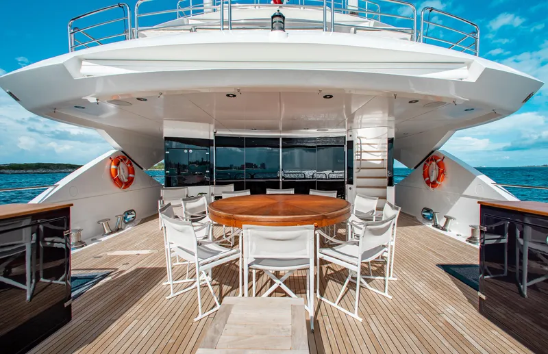 Slide: The Image of Luxurious 2014 Sunseeker 131 yacht cruising on vibrant blue ocean waters. - 5