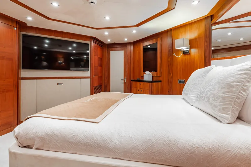 Slide: The Image of Luxurious bedroom interior of 2009 Sunseeker 121 yacht with modern amenities. - 18