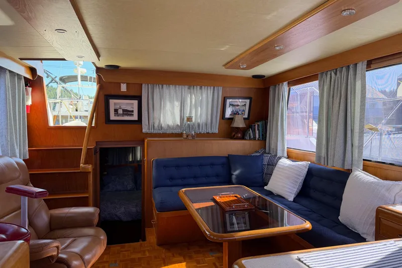 Slide: The Image of Electrical control panel of a 1988 Ocean Alexander 42' yacht, featuring various switches and gauges. - 16