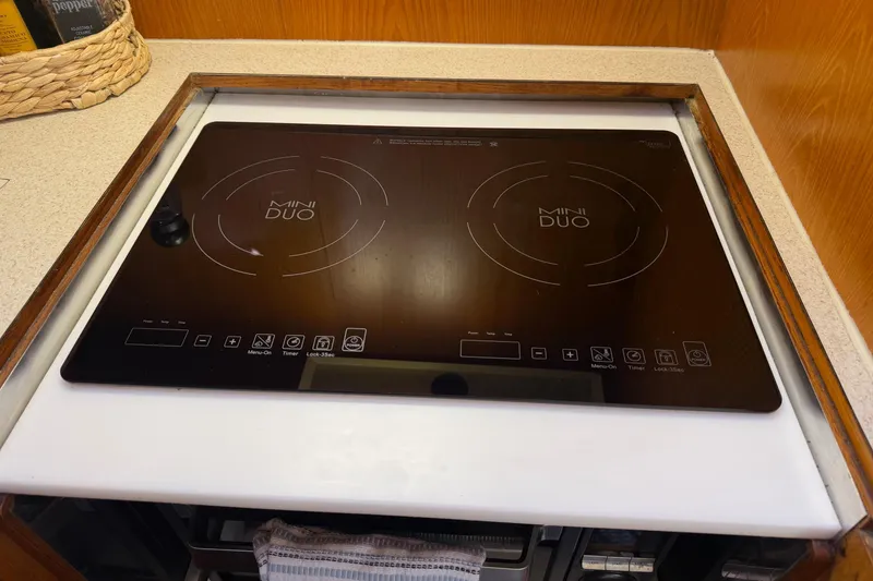 Slide: The Image of 1988 Ocean Alexander 42' yacht interior with wooden cabinetry and countertop accessories. - 27