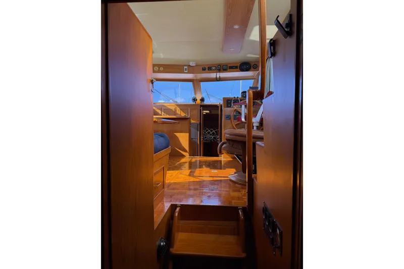 Slide: The Image of Interior of 1988 Ocean Alexander 42' yacht with kitchen and cozy cabin. - 28
