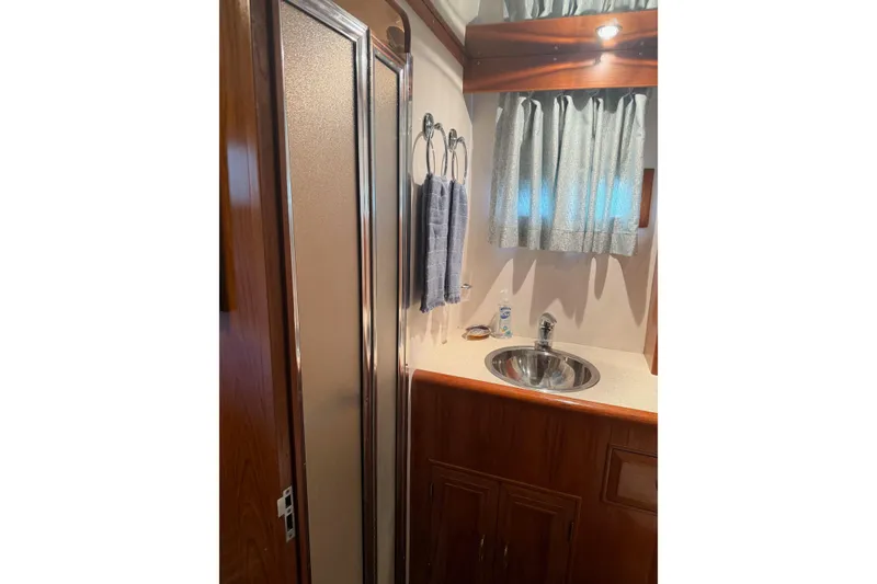 Slide: The Image of Induction cooktop on 1988 Ocean Alexander 42' yacht kitchen counter. - 32