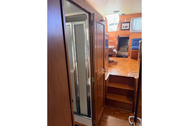 Slide: The Image of Bathroom interior of 1988 Ocean Alexander 42' yacht with wood cabinetry and stainless steel sink. - 36