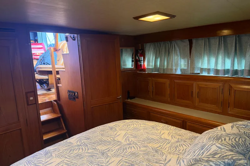 Slide: The Image of Shower area in 1988 Ocean Alexander 42' yacht with modern showerhead and lighting. - 39