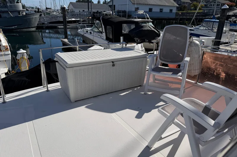 Slide: The Image of Interior view from 1988 Ocean Alexander 42' yacht, overlooking marina and water. - 10