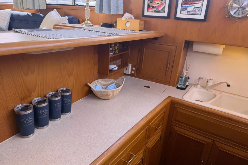 Slide: The Image of Interior of 1988 Ocean Alexander 42' yacht with cozy seating and elegant decor. - 21