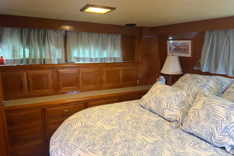 Slide: The Image of Bathroom interior of 1988 Ocean Alexander 42' yacht with toilet and towels. - 38
