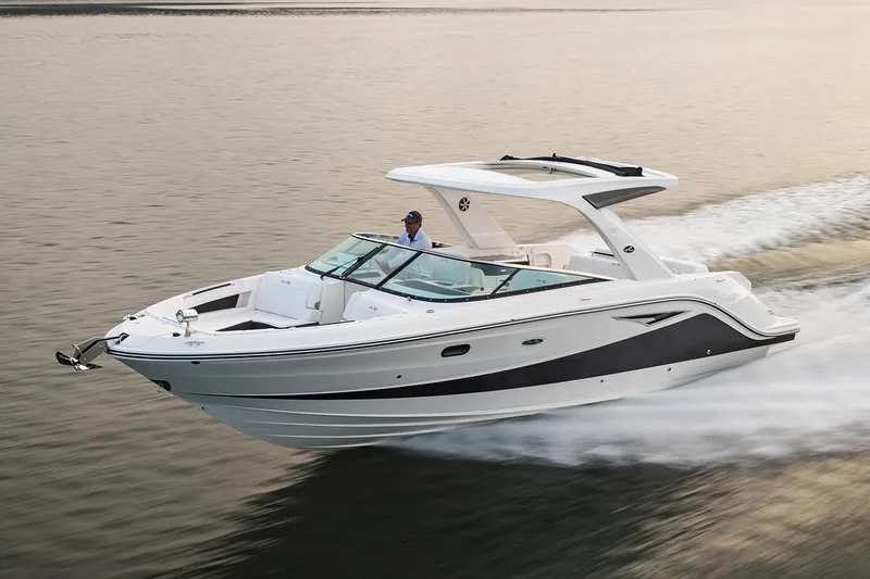 The Image of 2021 Sea Ray SLX 310 boat cruising on a calm river under a clear blue sky. - 0