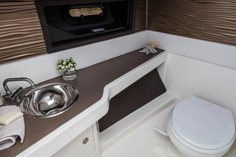 Slide: The Image of 2021 Sea Ray SLX 310 boat interior detail with sleek design and modern finish. - 14