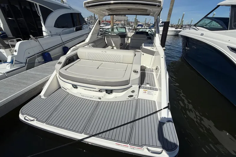 Slide: The Image of Display showing engine hours for 2021 Sea Ray SLX 310 boat. - 24