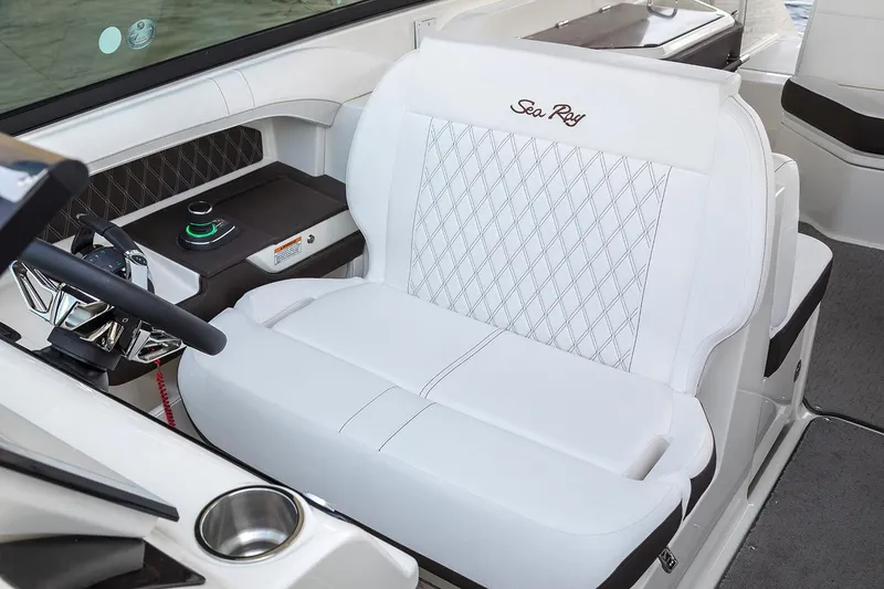 Slide: The Image of Simrad marine radio on 2021 Sea Ray SLX 310 boat dashboard. - 5