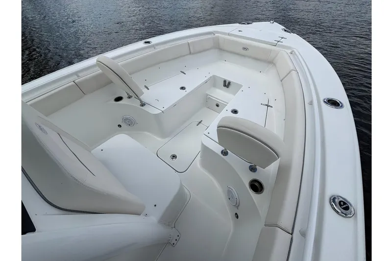 Slide: The Image of 2024 Sea Hunt Ultra 255 SE boat interior with spacious seating and sleek design. - 25