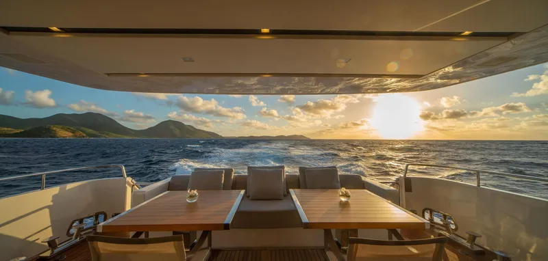 Slide: The Image of Luxurious Sanlorenzo SL86 yacht deck with ocean sunset view, 2018 model. - 14