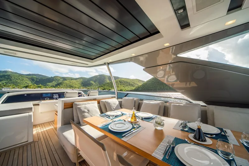 Slide: The Image of Luxurious 2018 Sanlorenzo SL86 yacht dining area with scenic ocean view. - 16