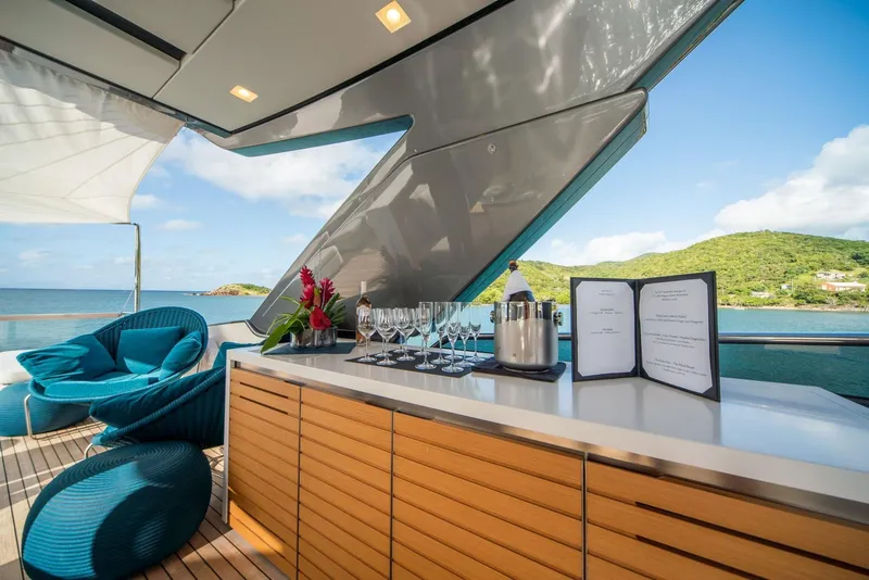 Slide: The Image of Luxurious 2018 Sanlorenzo SL86 yacht deck with elegant seating and ocean view. - 22