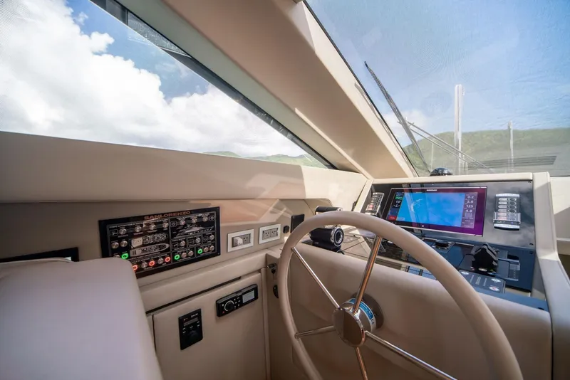 Slide: The Image of Helm of 2018 Sanlorenzo SL86 yacht with modern navigation equipment and steering wheel. - 40