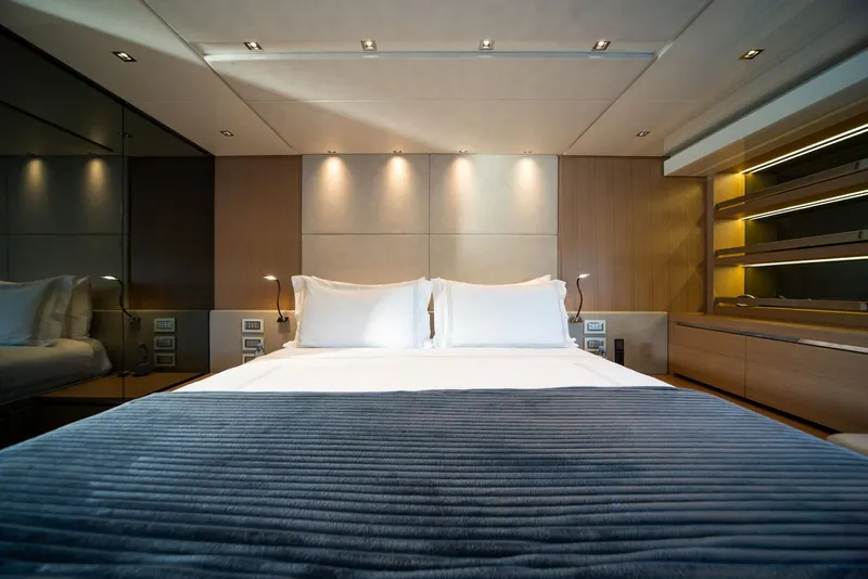 Slide: The Image of Luxurious bedroom interior on 2018 Sanlorenzo SL86 yacht, featuring modern design and ambient lighting. - 45