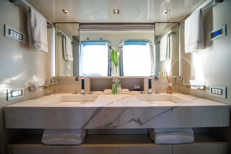 Slide: The Image of Luxurious bathroom on 2018 Sanlorenzo SL86 yacht with marble double sink and elegant fixtures. - 48