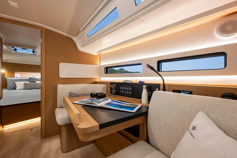 Slide: The Image of 2026 Jeanneau Sun Odyssey 415 interior with cozy seating and modern design. - 17
