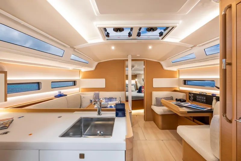 Slide: The Image of Luxurious interior of 2026 Jeanneau Sun Odyssey 415 yacht, featuring modern design and spacious layout. - 19