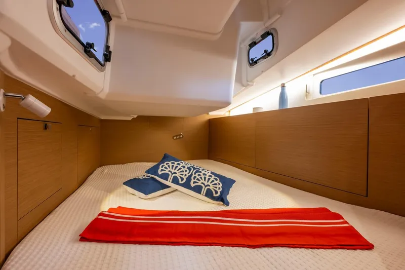 Slide: The Image of Cozy cabin interior of 2026 Jeanneau Sun Odyssey 415 yacht with modern design. - 21