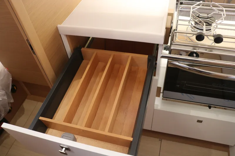 Slide: The Image of Kitchen drawer and stove in 2026 Jeanneau Sun Odyssey 415 yacht interior. - 47