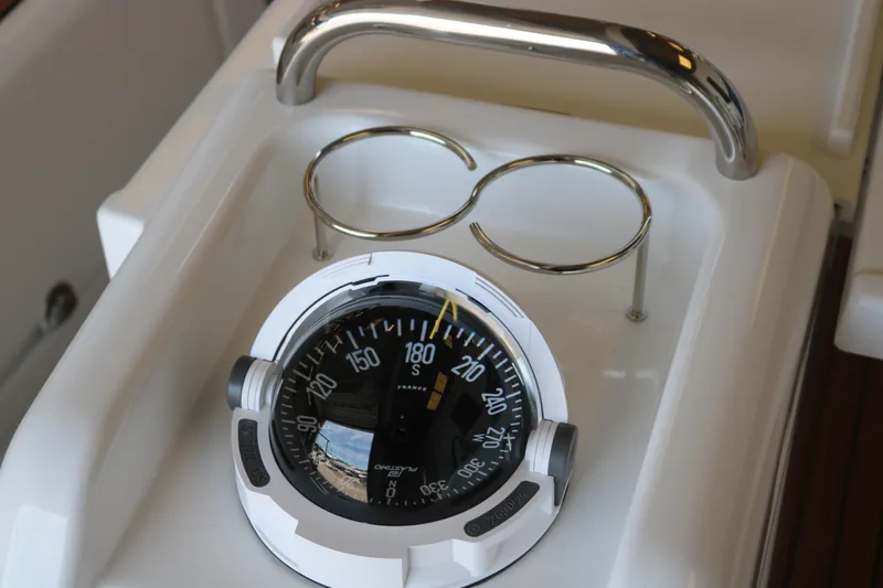 Slide: The Image of Compass on Jeanneau Sun Odyssey 415 yacht, 2026 model, with stainless steel handle. - 13